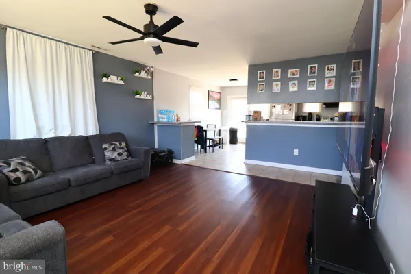 a living room with furniture and window