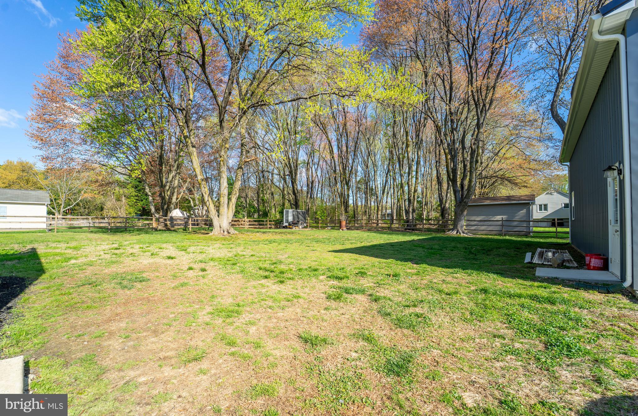 120 Tennessee Road Stevensville, MD 21666 - Photo 12 of 49 a backyard of a house with lots of green space and fountain