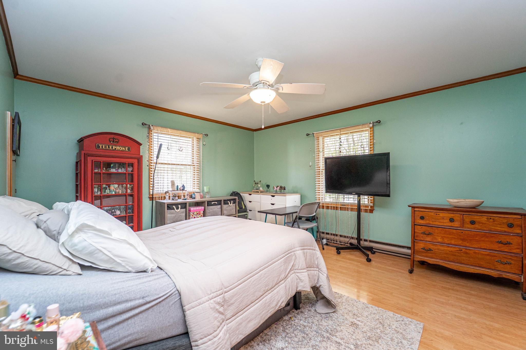 120 Tennessee Road Stevensville, MD 21666 - Photo 16 of 49 a bedroom with a bed and a flat screen tv