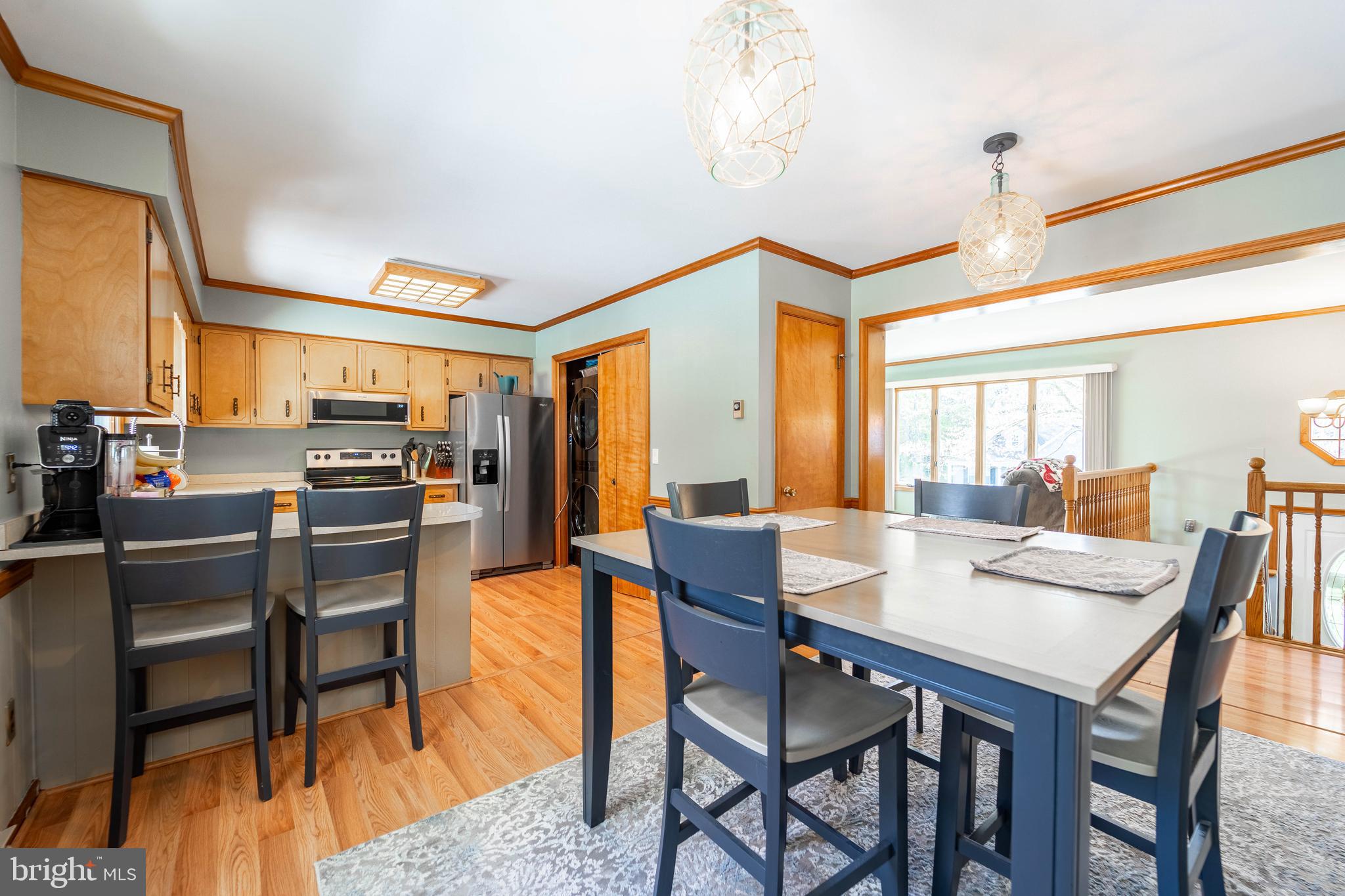120 Tennessee Road Stevensville, MD 21666 - Photo 41 of 49 a dining room with furniture and wooden floor