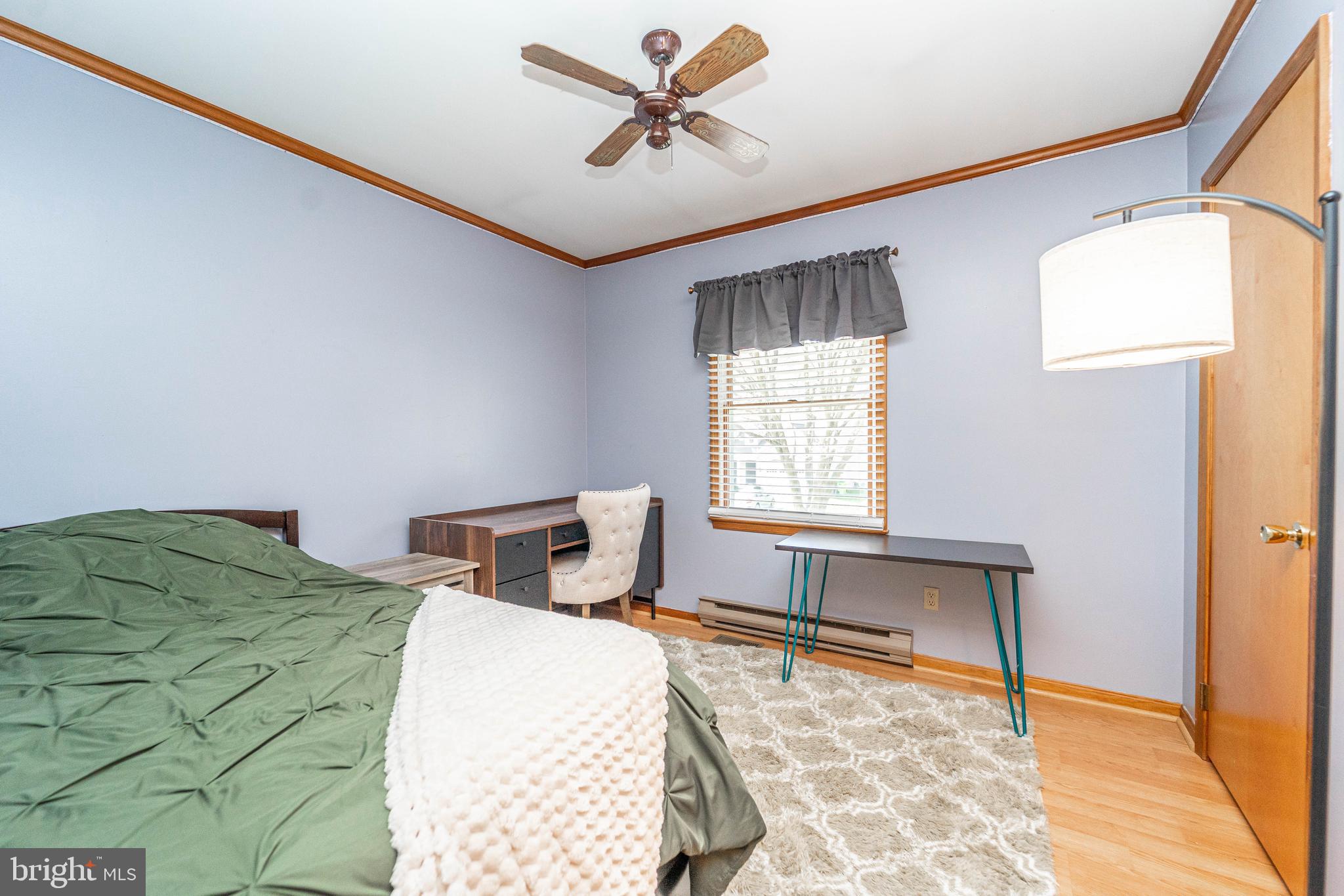 120 Tennessee Road Stevensville, MD 21666 - Photo 48 of 49 a bedroom with a bed and window
