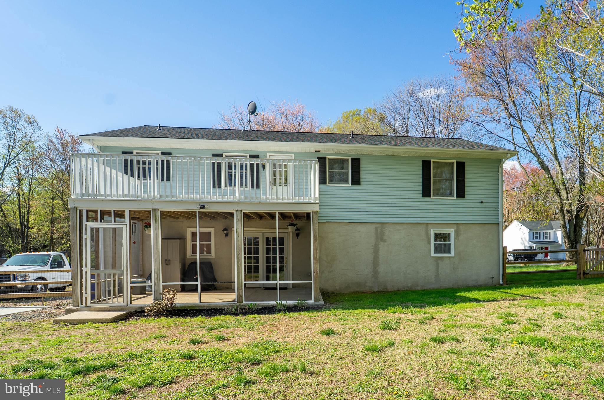 120 Tennessee Road Stevensville, MD 21666 - Photo 7 of 49 a front view of a house with a yard