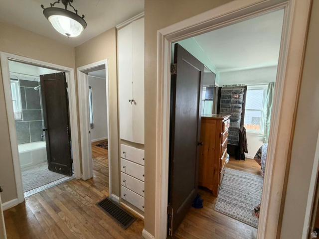 156 D Street Helper, UT 84526 - Photo 15 of 24 Hall with light wood-style floors and baseboards