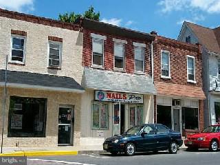 203 Bridgeboro Street Riverside, NJ 08075 - Photo 1 of 1 a car parked in front of a building