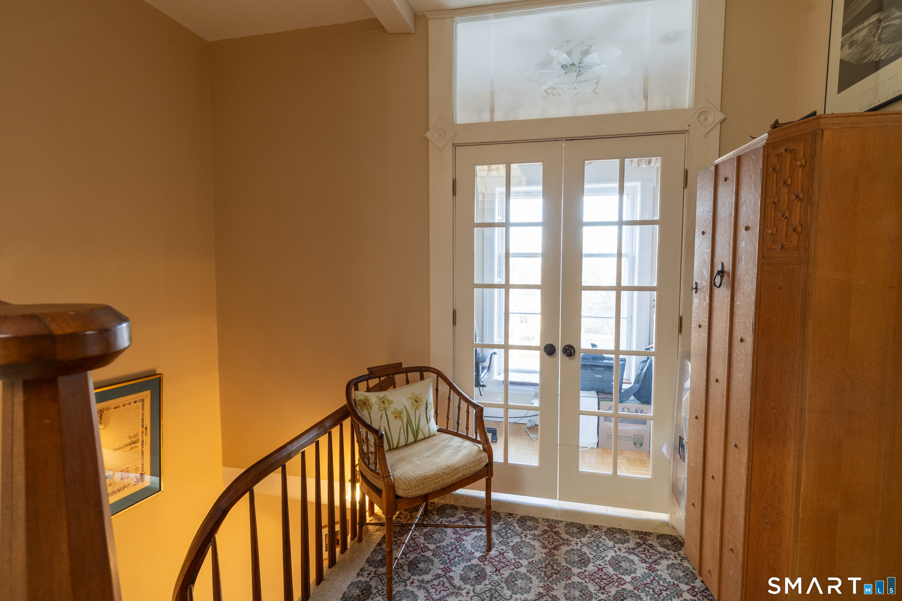 8 West Mystic Avenue Groton, CT 06355 - Photo 33 of 40 a view of a hallway with furniture and windows