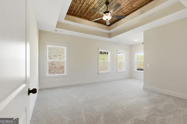 an empty room with windows