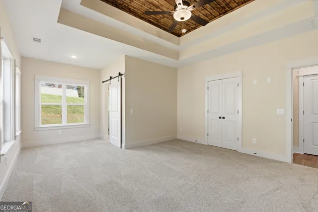 en empty room with windows