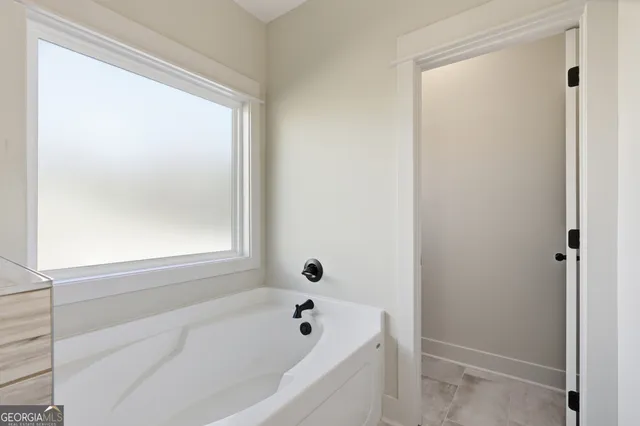 a bathroom with a bathtub