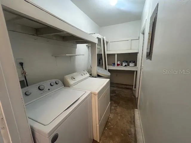 a utility room with dryer and washer