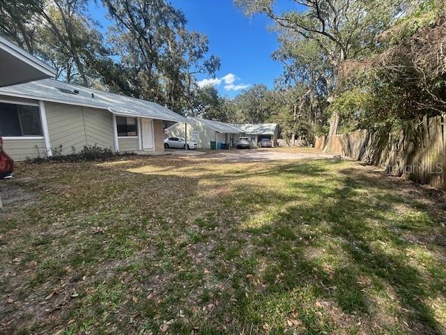 2523 Alexa Court Winter Park, FL 32792 - Photo 2 of 20 a front view of a house with a yard