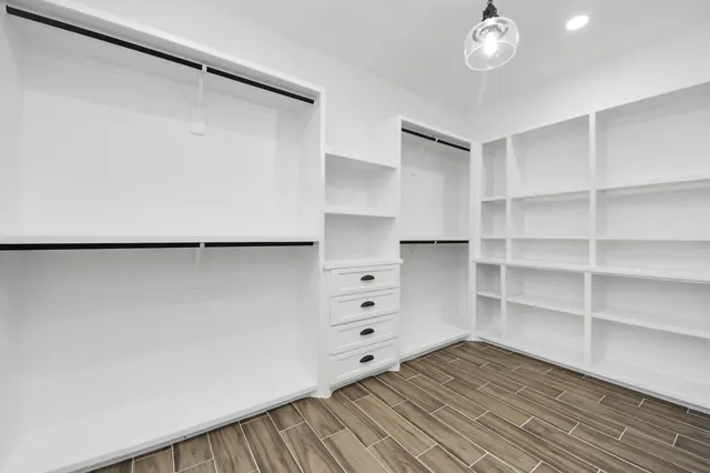 an aerial view of a house with a garden