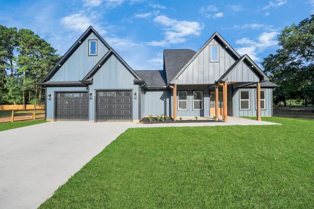 front view of a house with a yard