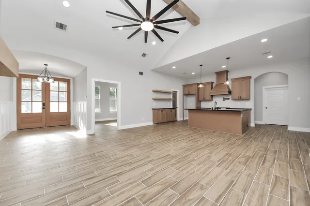 a view of kitchen with cabinets and wooden floor