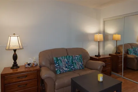 a view of a bathroom with a sink and mirror