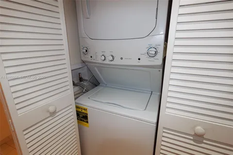 a bathroom with a sink double vanity and a mirror