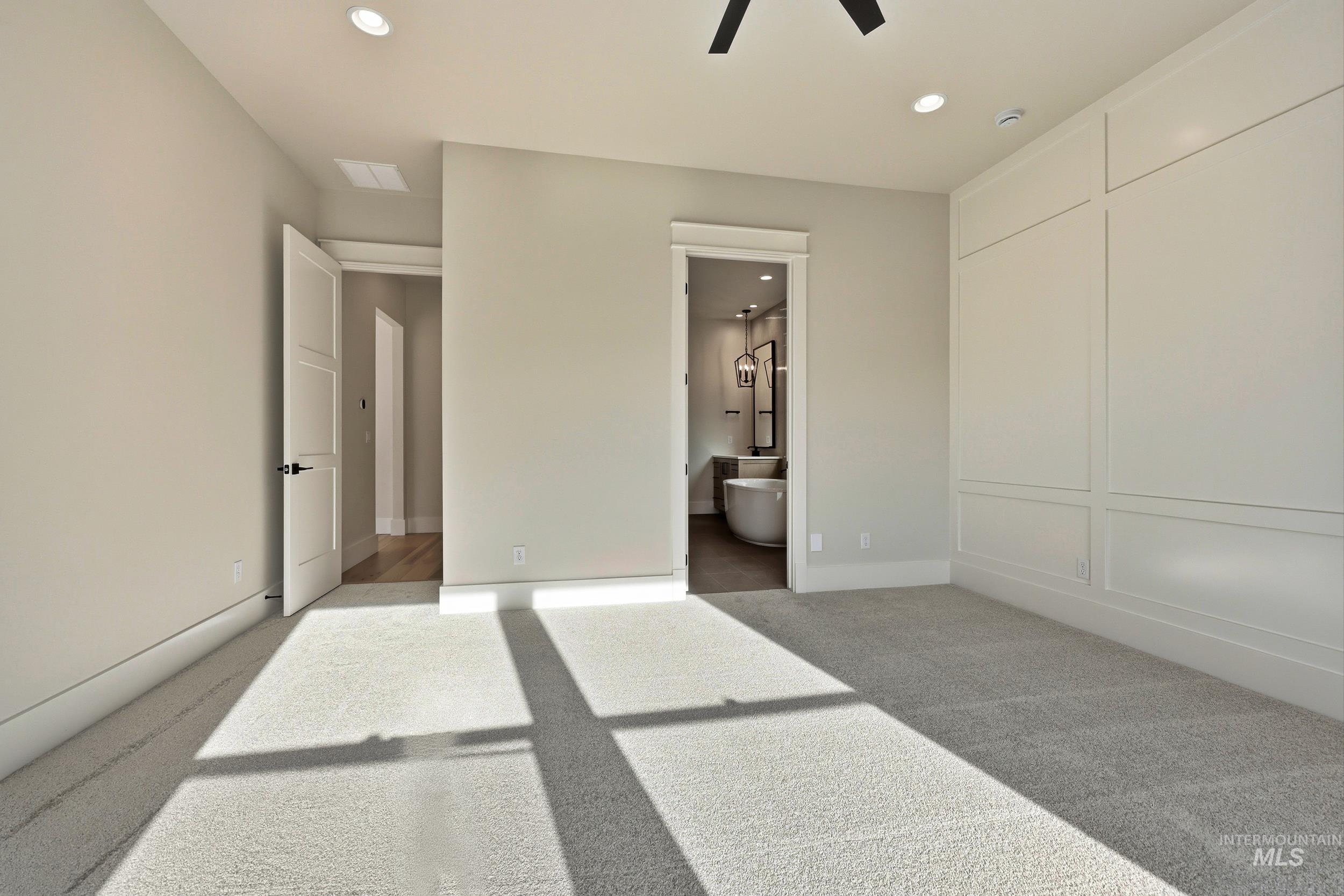 1090 East Crescendo Street Meridian, ID 83642 - Photo 13 of 43 Unfurnished bedroom featuring recessed lighting, light carpet, connected bathroom, and a ceiling fan