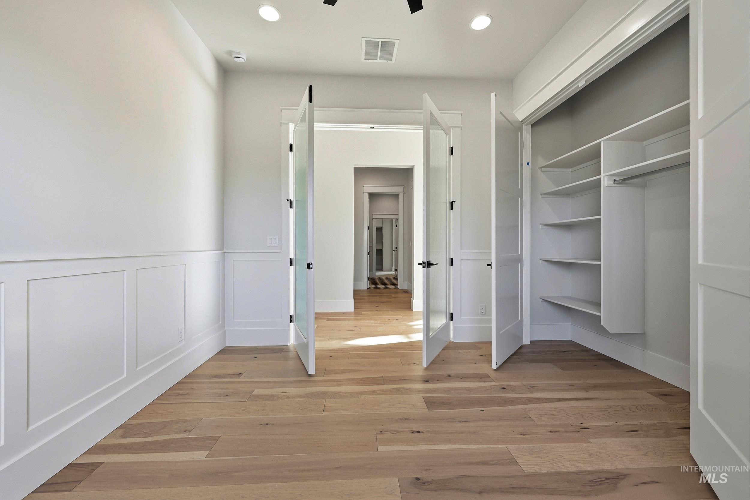 1090 East Crescendo Street Meridian, ID 83642 - Photo 26 of 43 Unfurnished bedroom featuring light wood finished floors, recessed lighting, a ceiling fan, and a closet