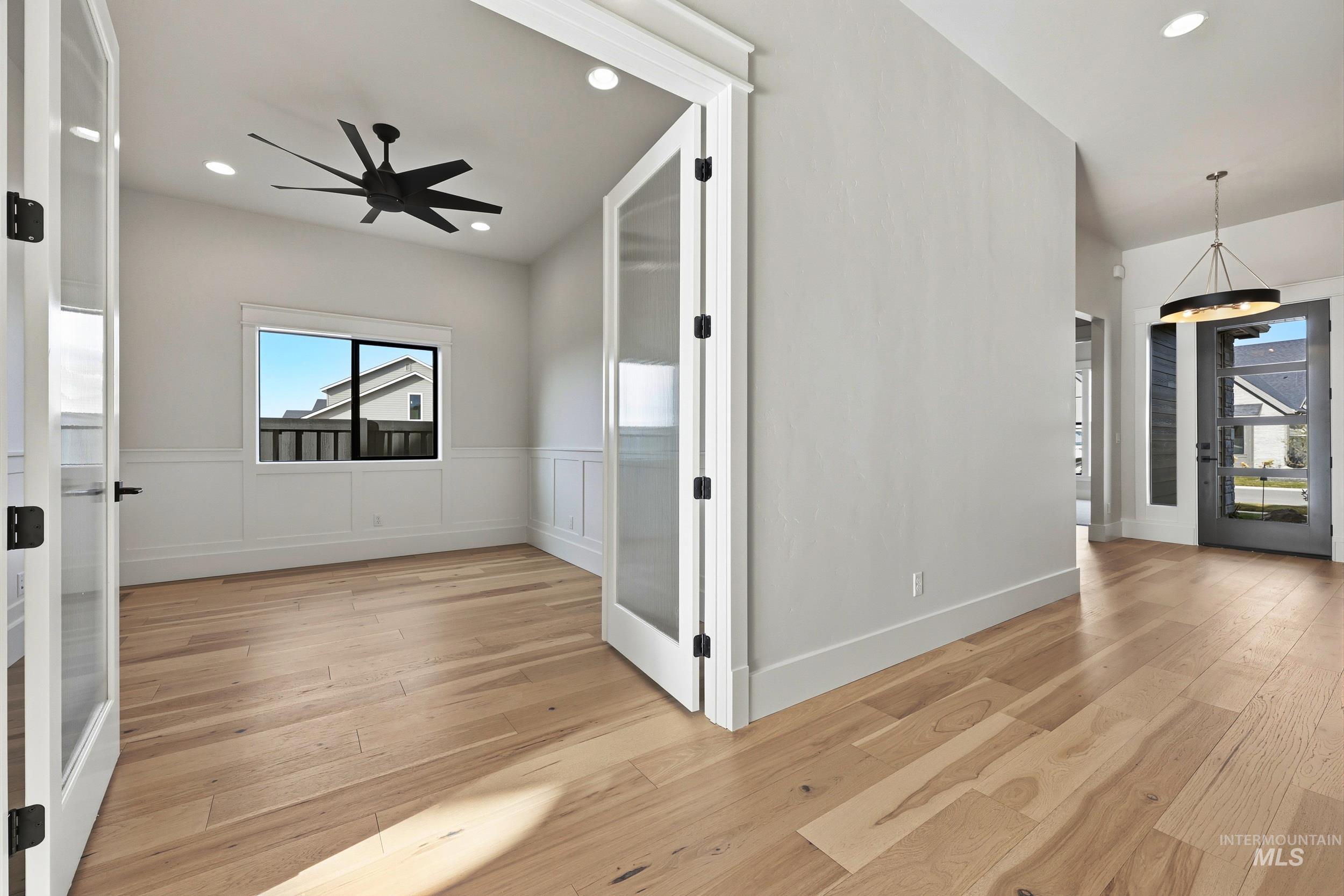 1090 East Crescendo Street Meridian, ID 83642 - Photo 28 of 43 Entryway with french doors, light wood finished floors, recessed lighting, and a ceiling fan