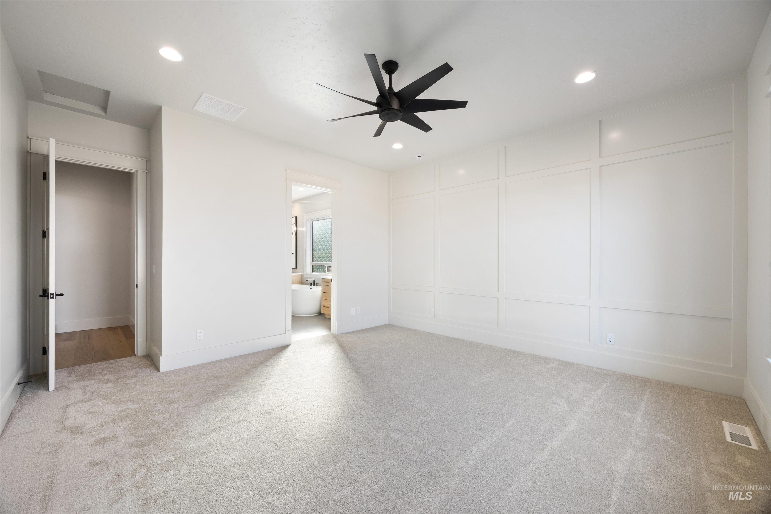 1090 East Crescendo Street Meridian, ID 83642 - Photo 27 of 50 Unfurnished bedroom featuring light carpet, recessed lighting, and ceiling fan