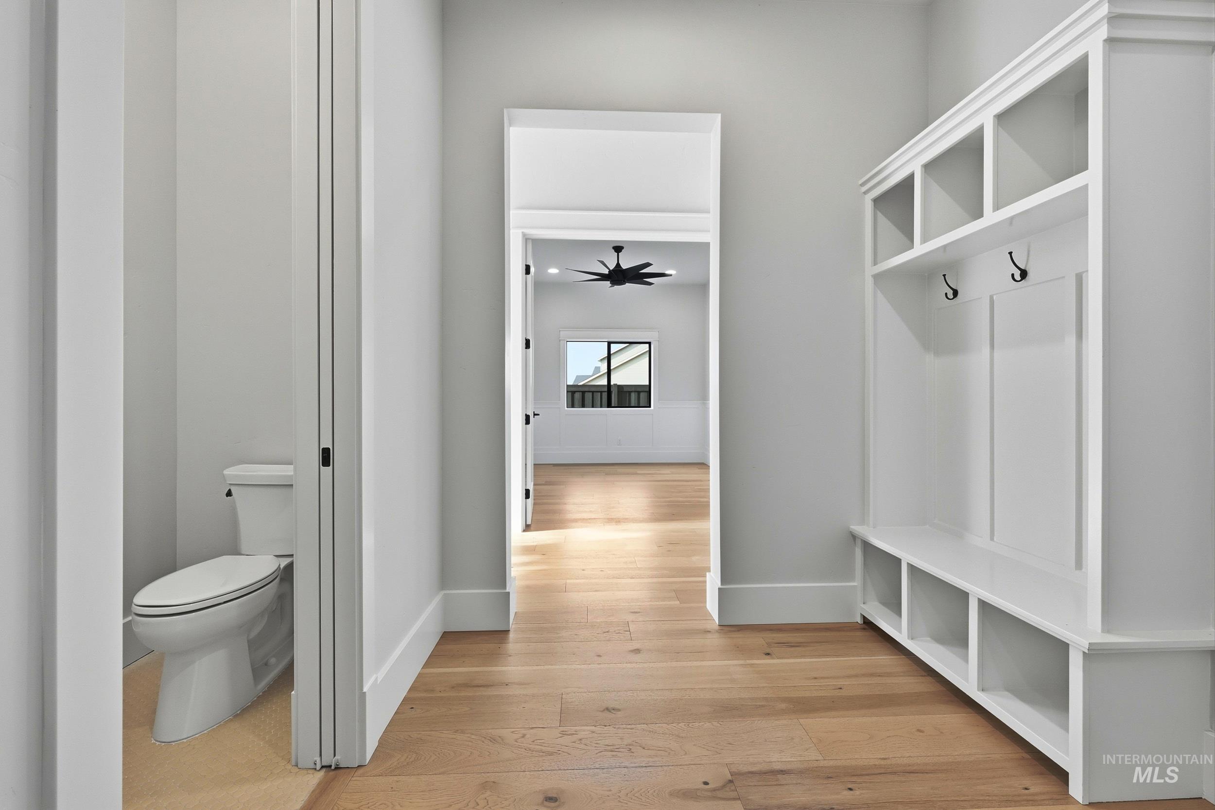 1090 East Crescendo Street Meridian, ID 83642 - Photo 30 of 43 Mudroom with light wood-style floors and ceiling fan