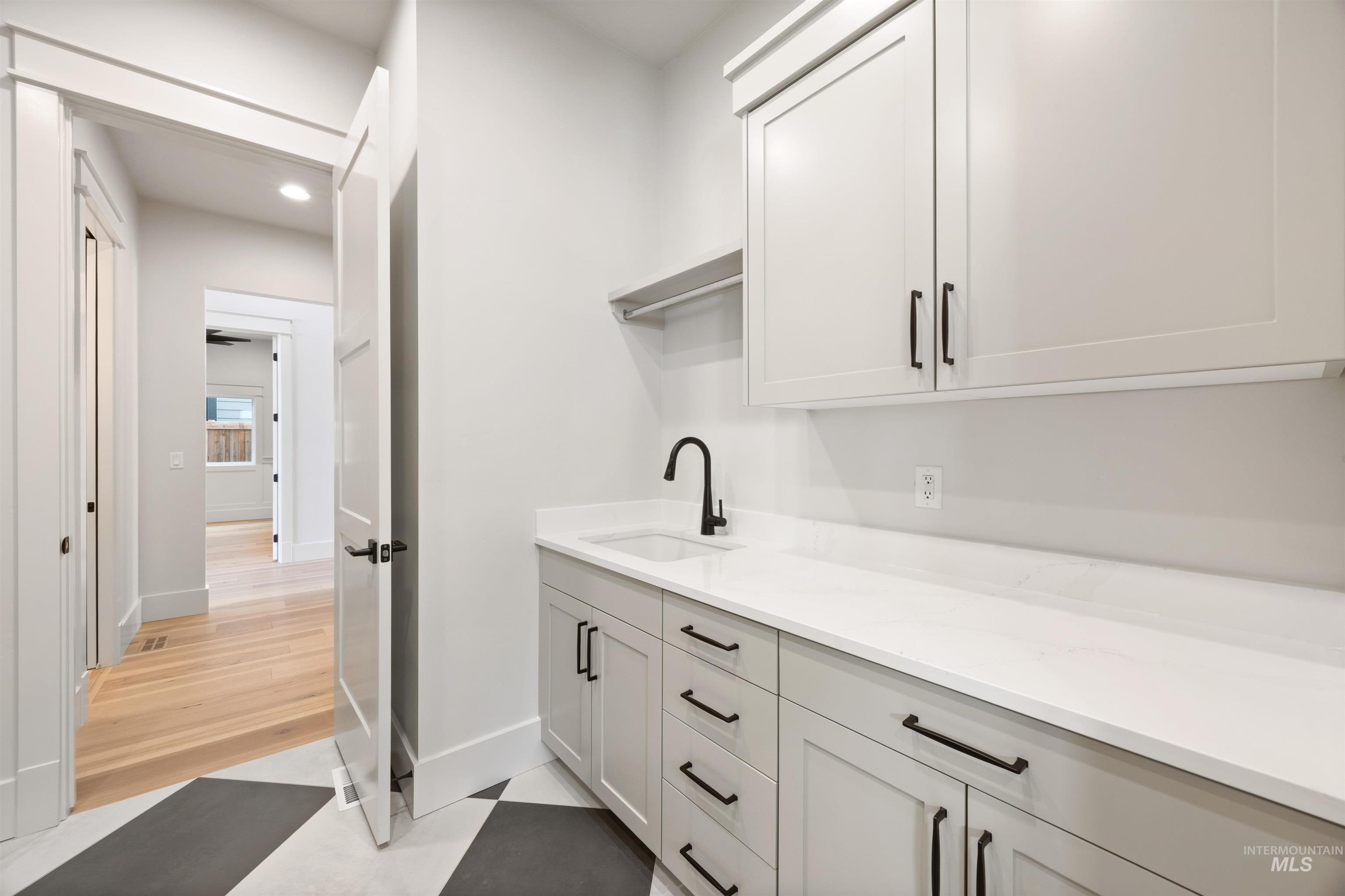 1090 East Crescendo Street Meridian, ID 83642 - Photo 33 of 50 Laundry area with baseboards and recessed lighting