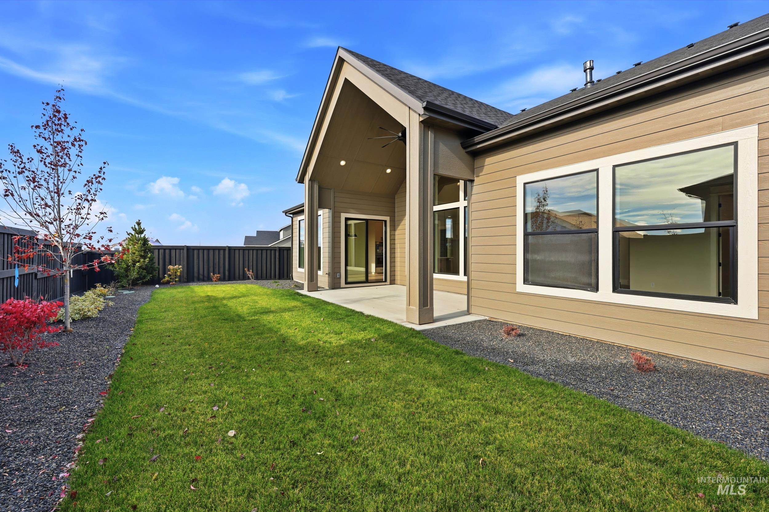1090 East Crescendo Street Meridian, ID 83642 - Photo 34 of 43 Fenced backyard featuring a patio and a ceiling fan