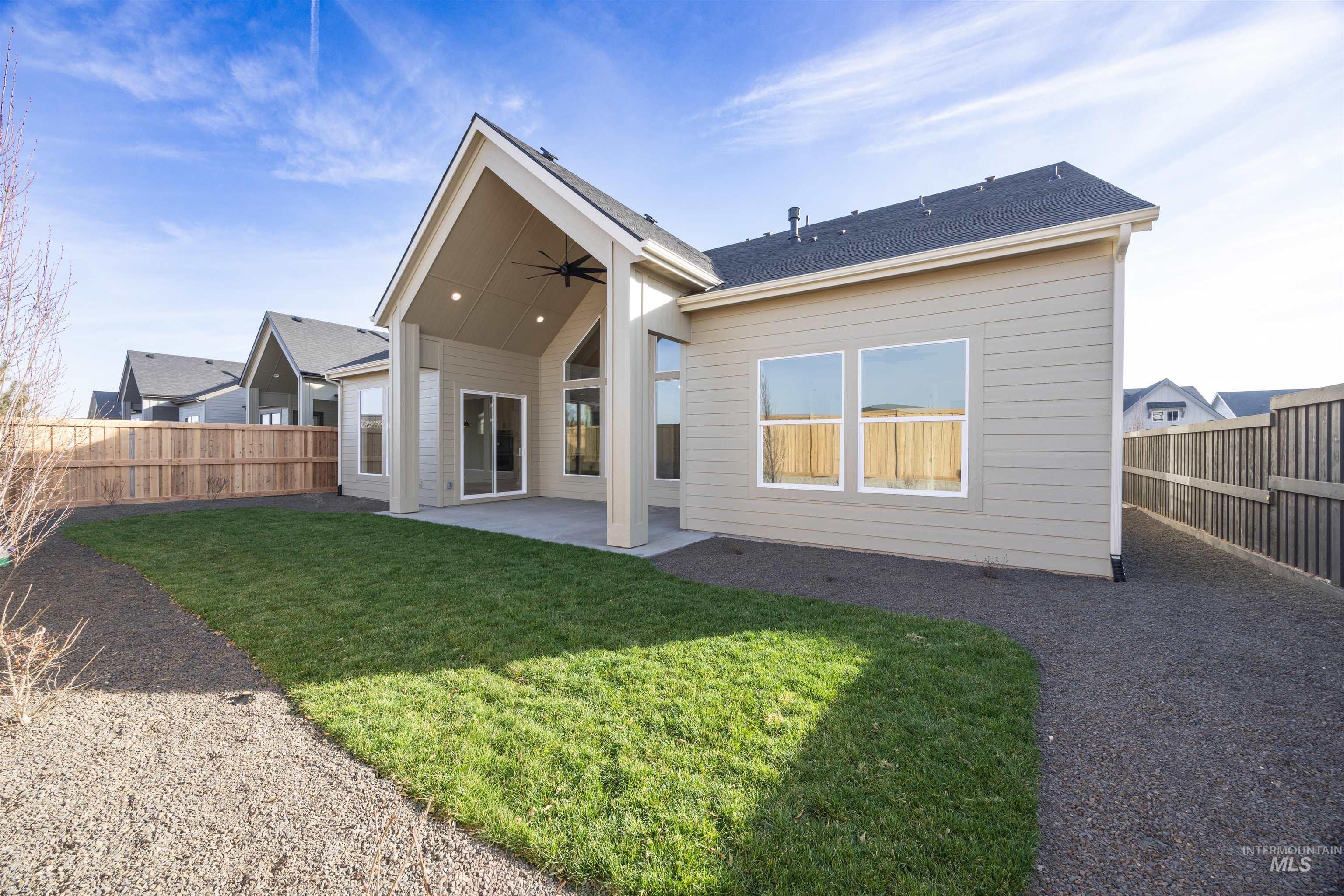 1090 East Crescendo Street Meridian, ID 83642 - Photo 40 of 50 Rear view of property with a patio, a fenced backyard, ceiling fan, and roof with shingles