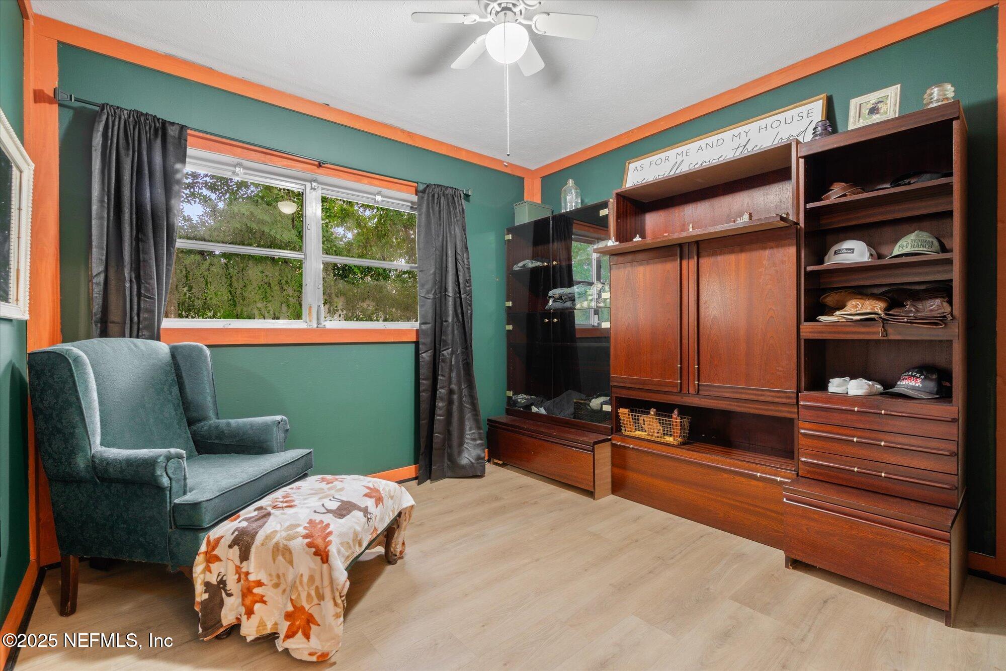 2025 Kate Street Palatka, FL 32177 - Photo 19 of 36 a bedroom with furniture and a window