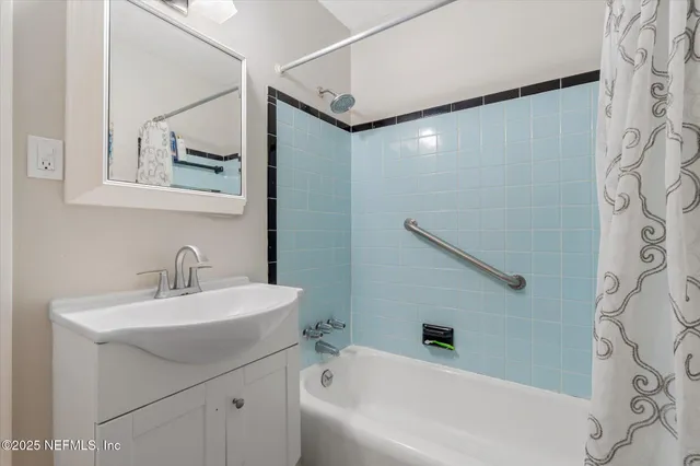 a bathroom with a sink and a bathtub