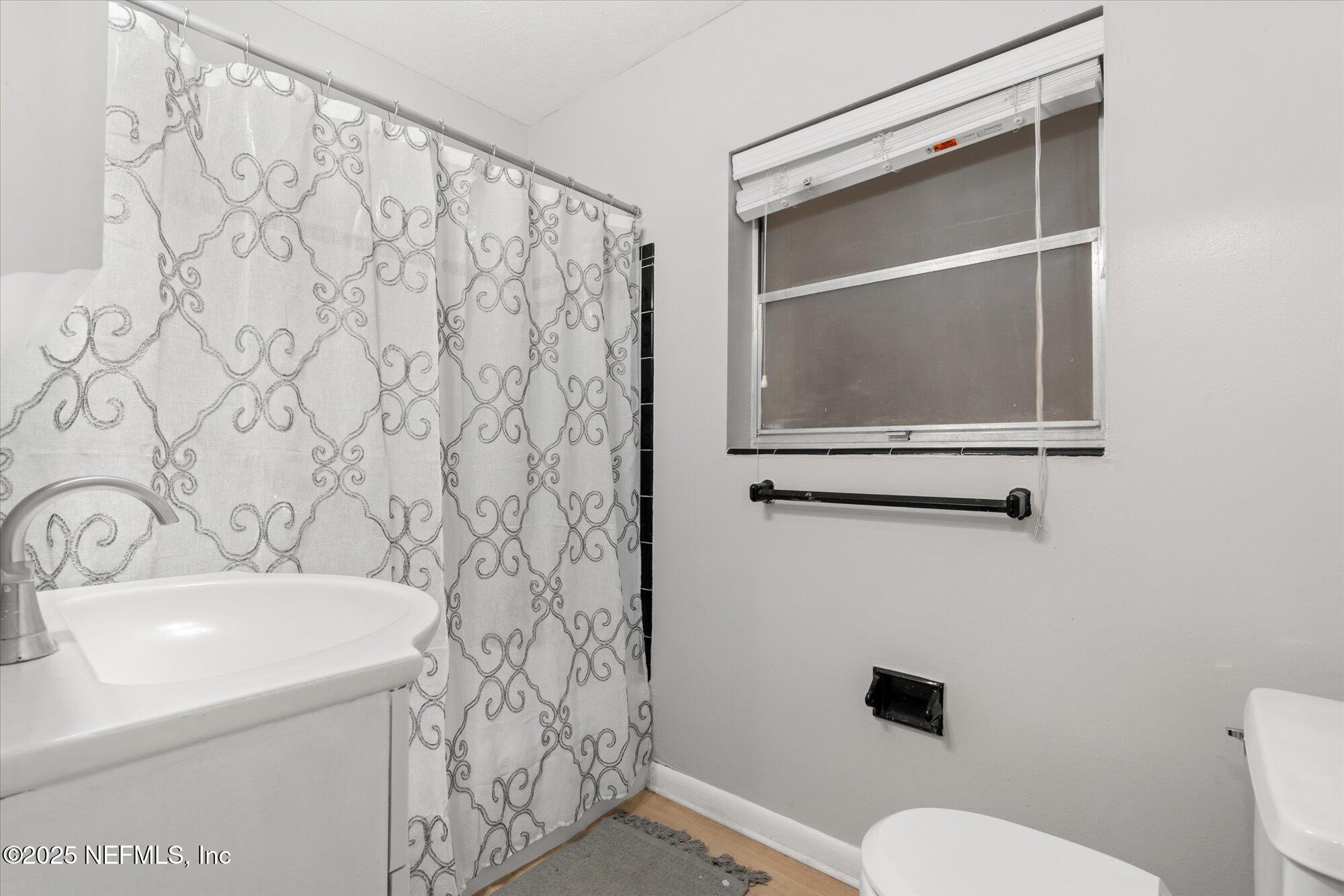 2025 Kate Street Palatka, FL 32177 - Photo 24 of 36 a bathroom with a sink and a toilet