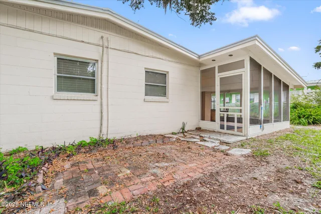 a view of a backyard of a house