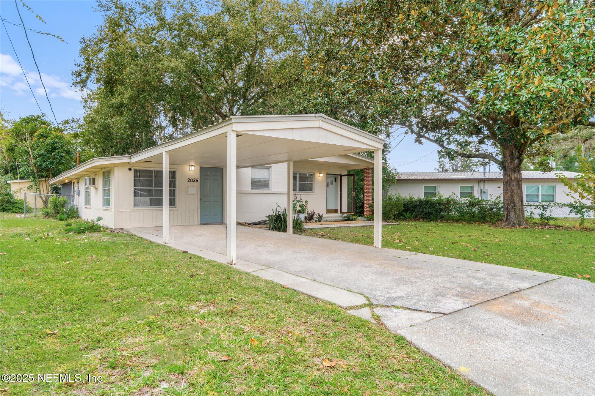 2025 Kate Street Palatka, FL 32177 - Photo 36 of 36 a view of a house with backyard and sitting area