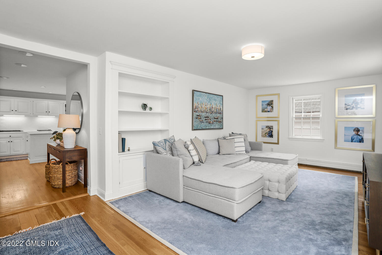 72 Lockwood Road Riverside, CT 06878 - Photo 16 of 23 a living room with furniture and a book shelf