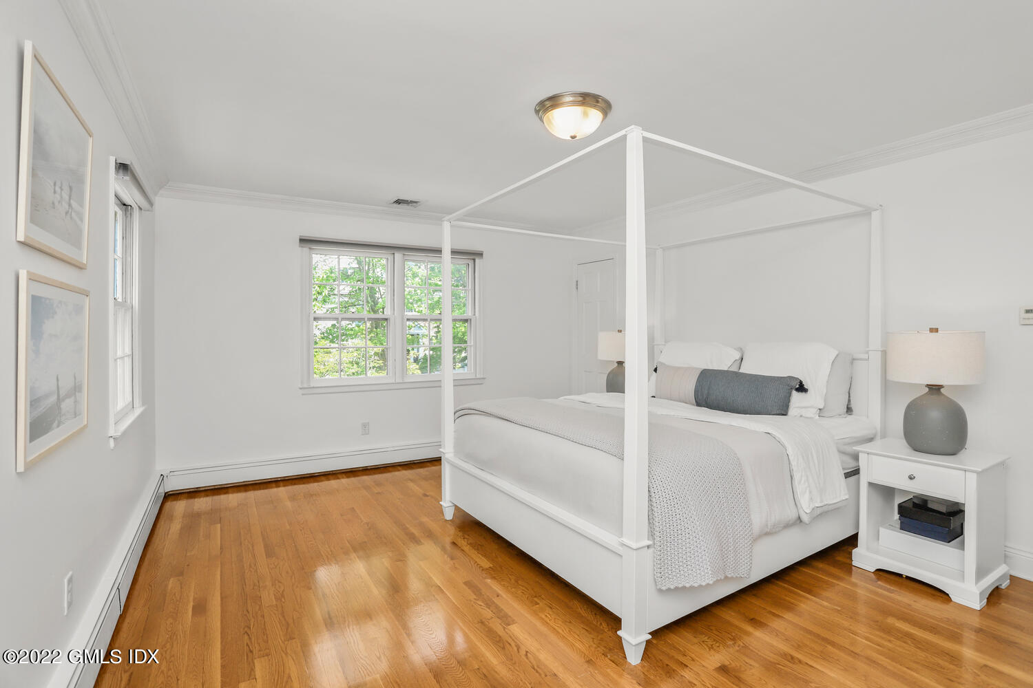 72 Lockwood Road Riverside, CT 06878 - Photo 19 of 23 a bedroom with a bed and a window