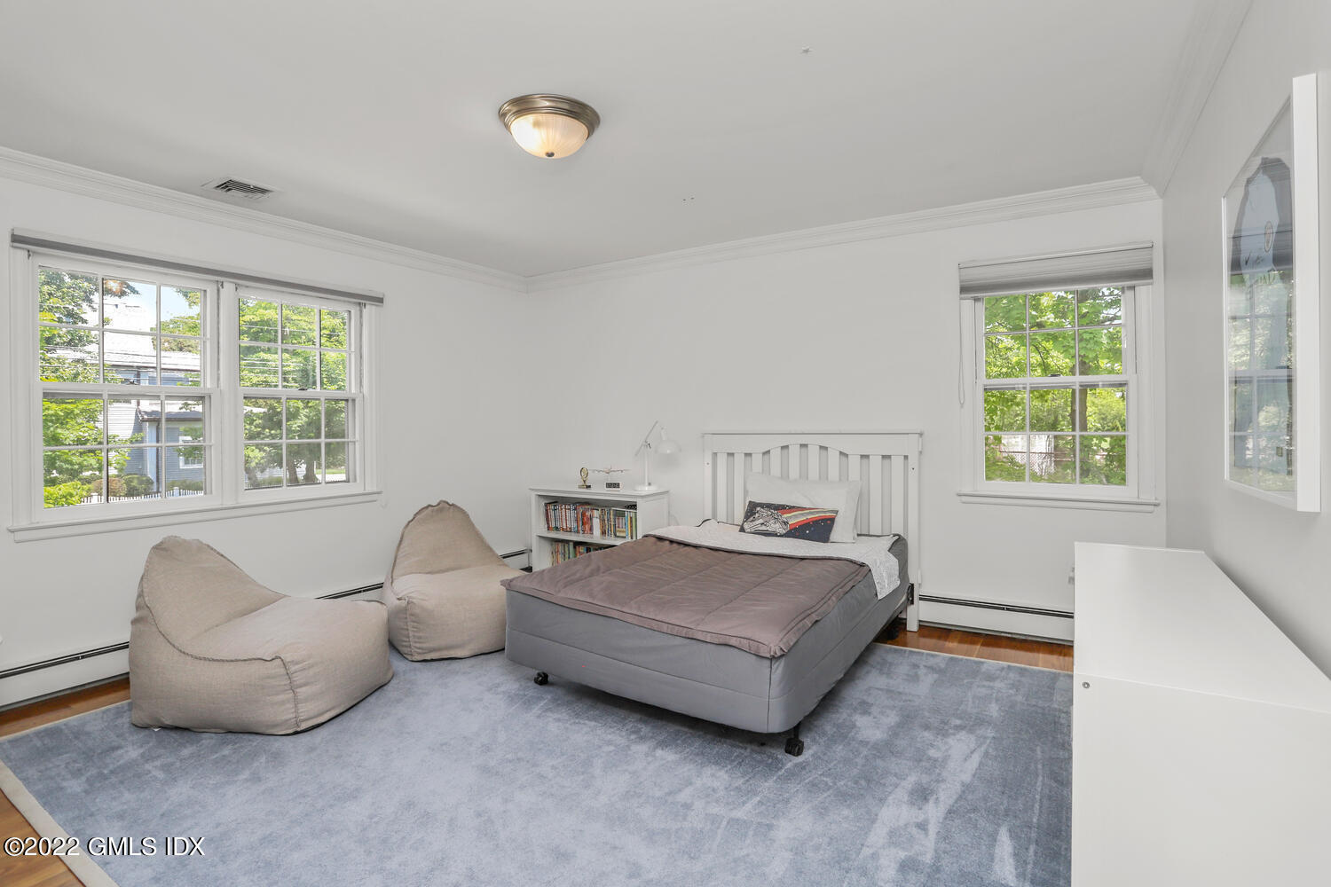 72 Lockwood Road Riverside, CT 06878 - Photo 20 of 23 a room with two bed and a couch