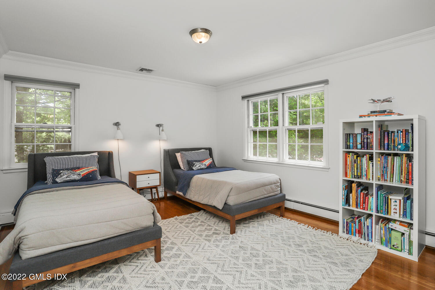 72 Lockwood Road Riverside, CT 06878 - Photo 21 of 23 a bedroom with furniture and a book shelf