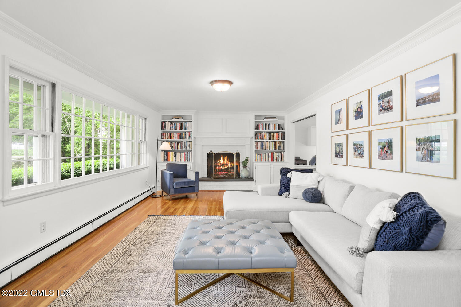72 Lockwood Road Riverside, CT 06878 - Photo 4 of 23 a living room with furniture and a fireplace