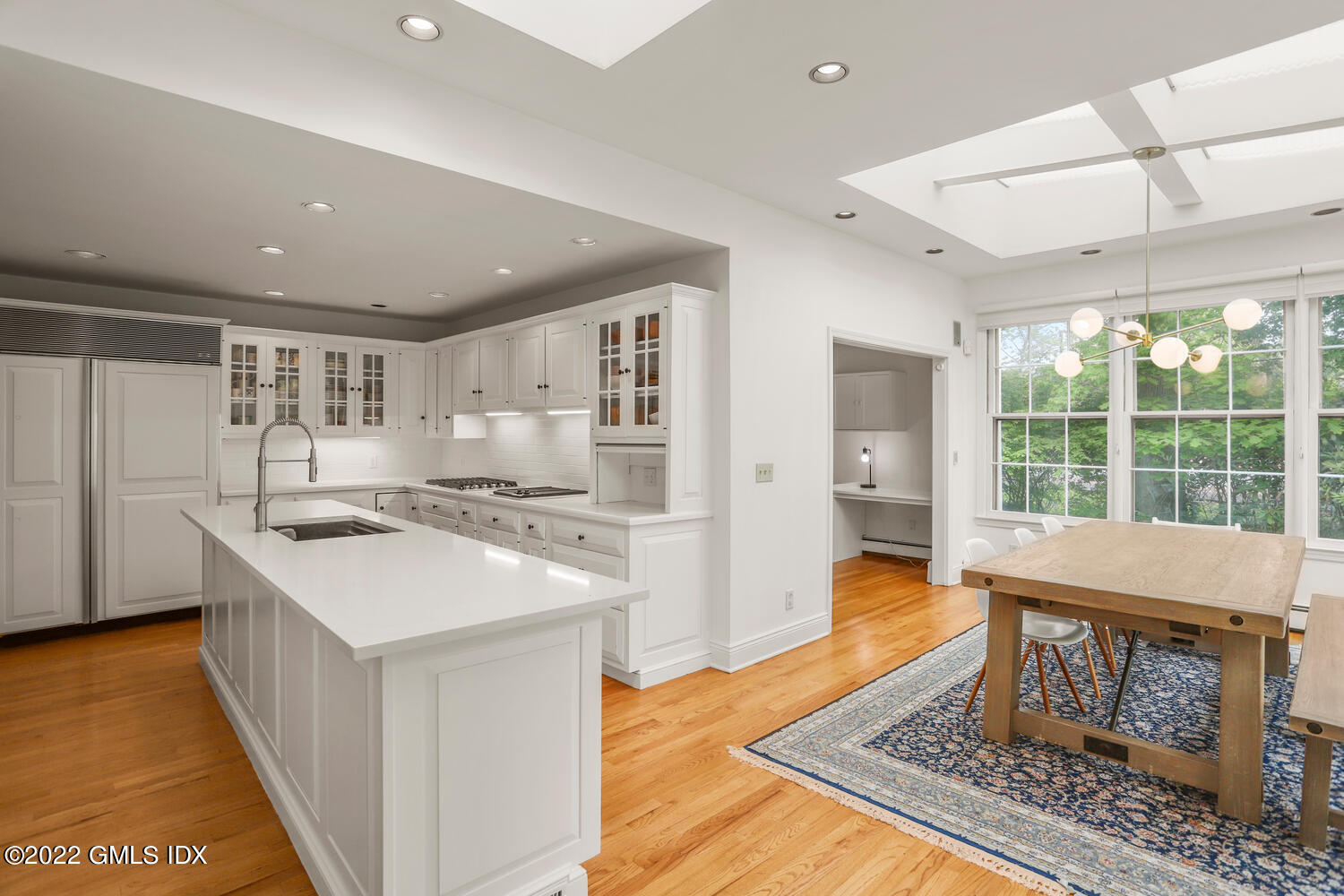 72 Lockwood Road Riverside, CT 06878 - Photo 10 of 23 a open kitchen with a sink appliances and cabinets