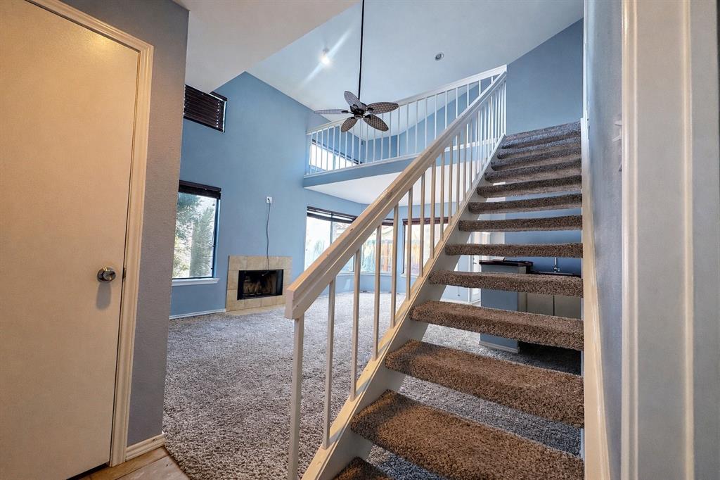 551 Ranch Trail, Unit 197 Irving, TX 75063 - Photo 2 of 14 a view of entryway and hall with wooden floor