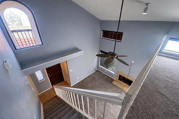 a view of a livingroom with furniture window and wooden floor