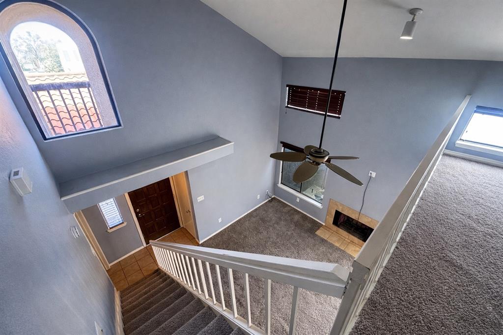 551 Ranch Trail, Unit 197 Irving, TX 75063 - Photo 8 of 14 a view of a livingroom with furniture window and wooden floor