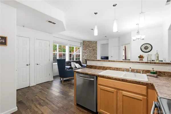 a kitchen with a stove microwave and refrigerator