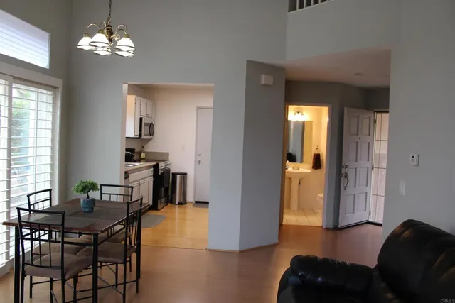 a view of a livingroom with furniture and windows