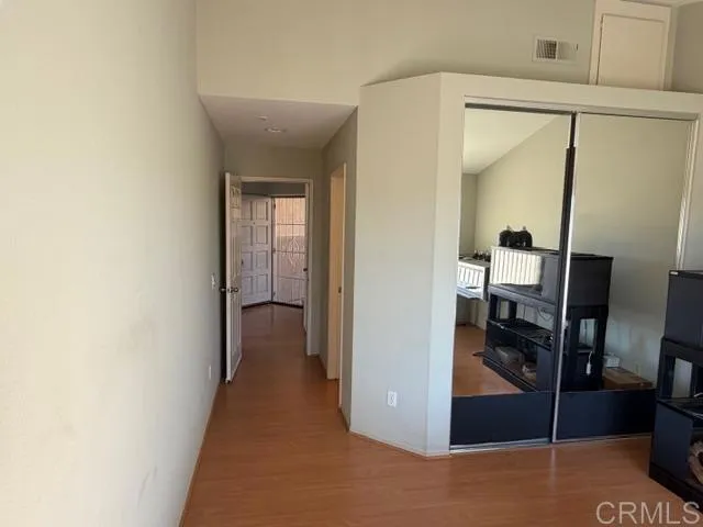 a view of hallway with livingroom