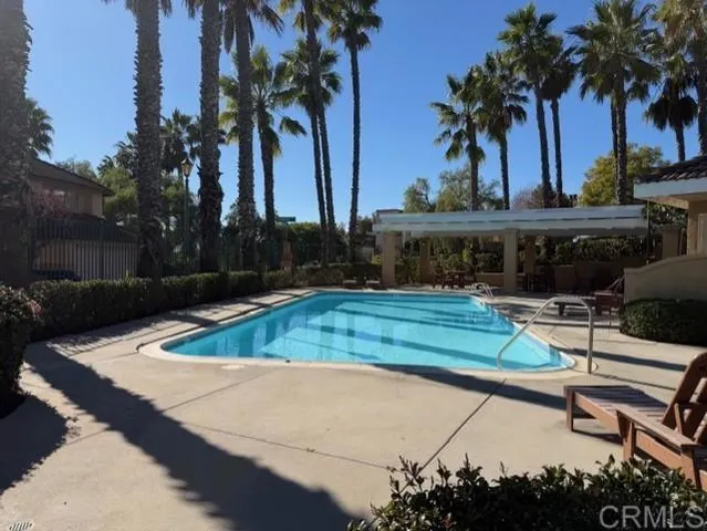a view of a backyard with a patio