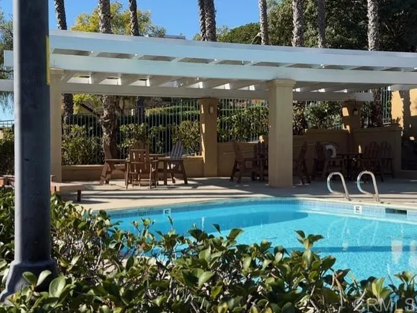 a view of a swimming pool and outdoor space