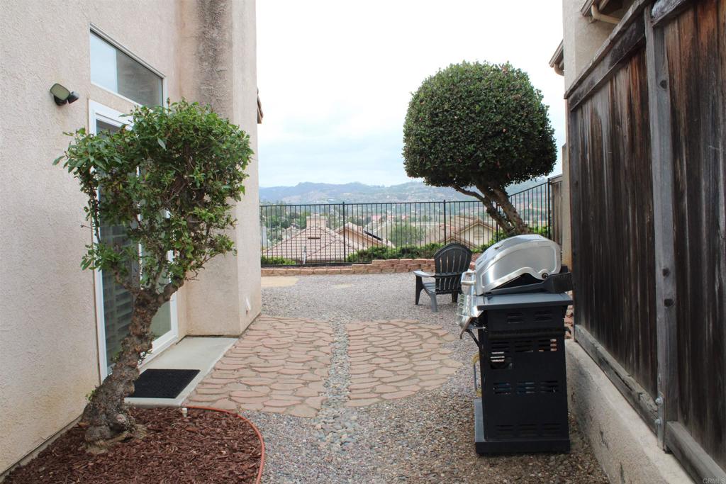 5735 Barbary Place Bonsall, CA 92003 - Photo 9 of 28 a view of entryway in front of house