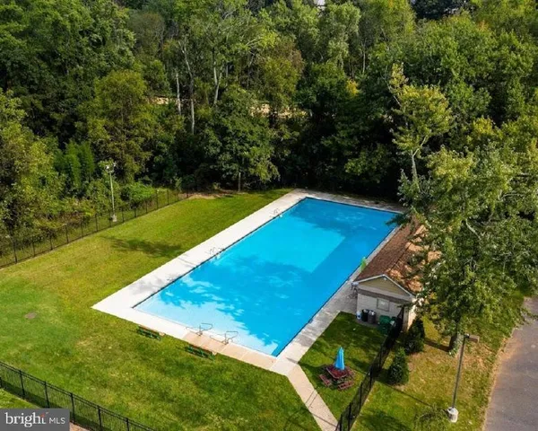 a view of an outdoor space and swimming pool