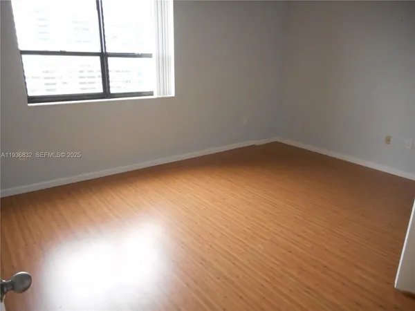 an empty room with a window