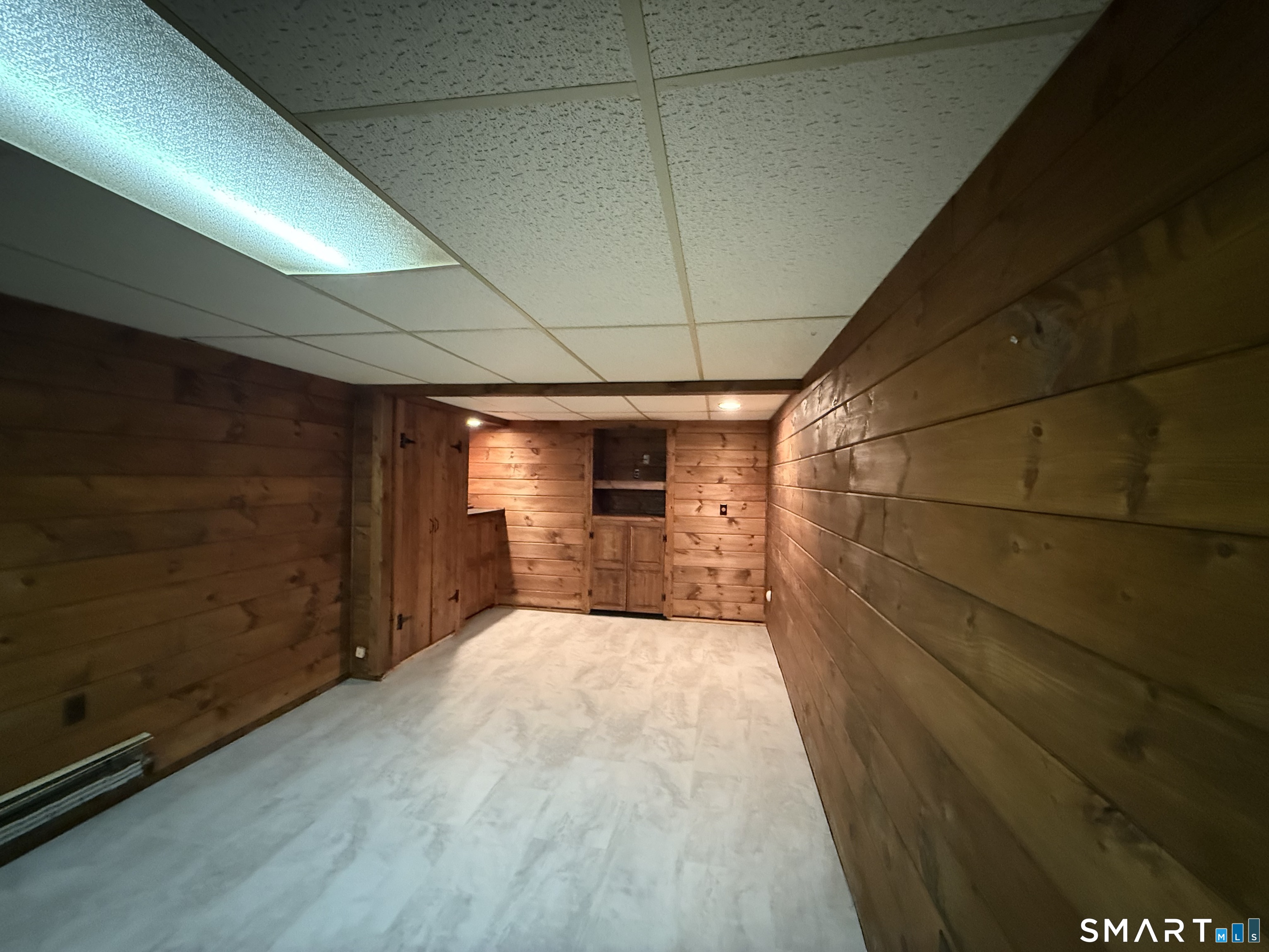 26 Maple Street Trumbull, CT 06611 - Photo 34 of 37 a view of a room with wooden floor and a window